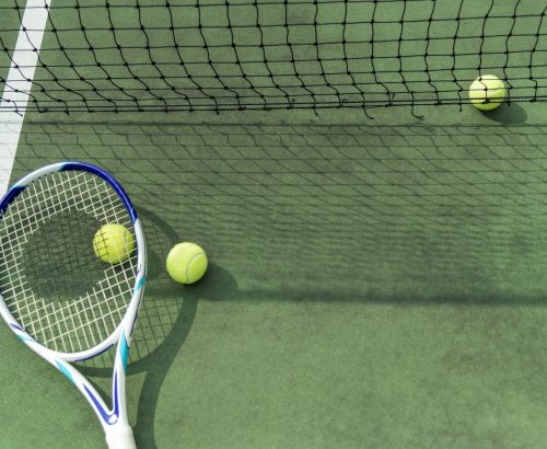 tennis-balls-on-a-tennis-court.jpg